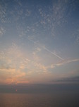 SX14849 Sunrise and airliner over channel.jpg